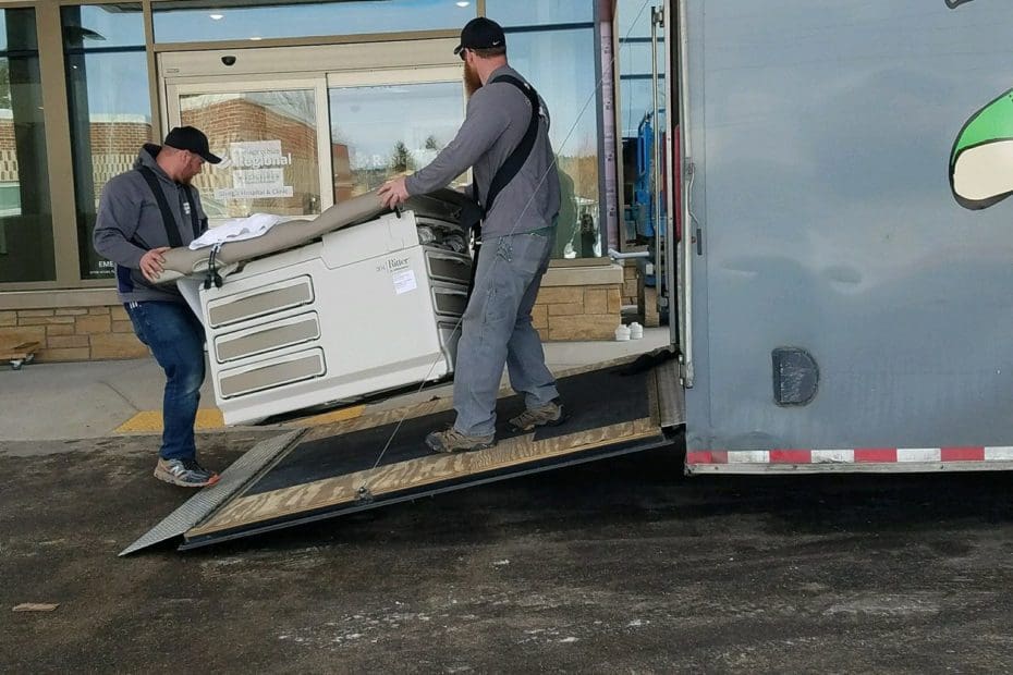 Movers unloading truck