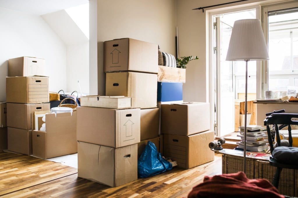 Moving boxes stacked up in a house