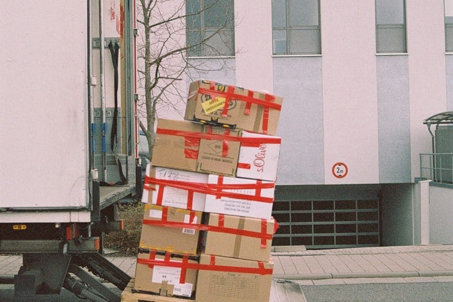 unloading a palette of moving boxes